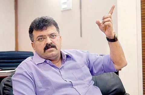 Awhad says RSS looted British palms