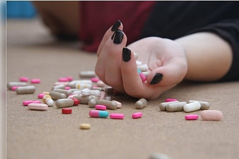 Suicide of a young woman for fear of notoriety