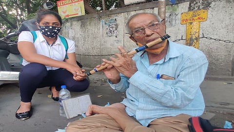 A flute player living with self respect at the age of 72 