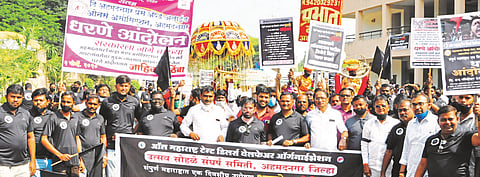 Businessmen march on the Collector's office