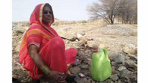 one old age woman strike to get the benefit of the land in shirur kasar beed