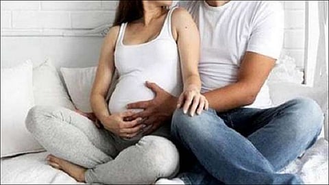 woman living with four boyfriends got pregnant and says four are father of this child