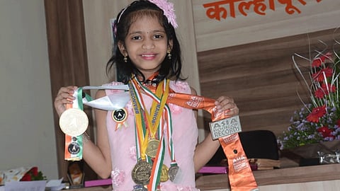 Kolhapur girl recorded in Asia Book of Records with India Book of Records