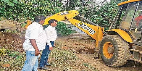 digged pits at bank of Yerla river to prevent sand smuggling; Roads leading to the river are closed