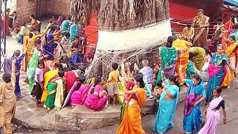 women perform rituals at home