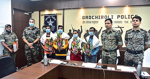 Four extremist Naxalites surrender to police The prize was Rs 22 lakh