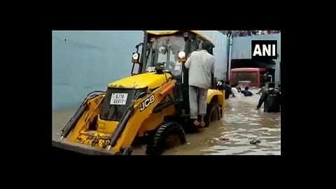 gujarat state transport bus being pulled jcb video viral