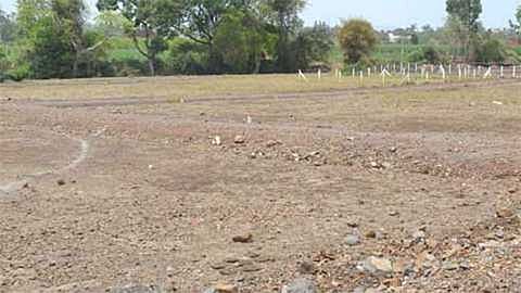 Undertaking to develop government land fraud in kolhapur marathi news