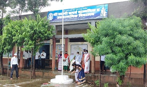 Flag hoisting by Vaishnavi Santosh Lahamge a girl who passed 10th in Rajur