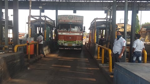 Queues of vehicles at Kini toll on the National Highway