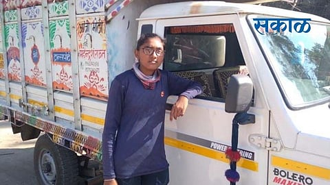 Tejaswini pulls the of the on her fathers four-wheeler