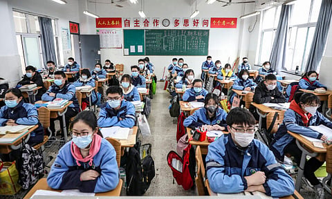 Students return to school after four months; first step towards reversing world conditions