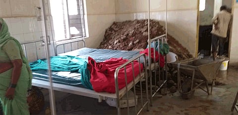 piles of mud in maternity hospital at belgaum