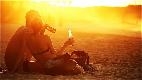 couple cought having rommance on family beach at philippines