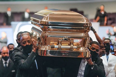 floyd buried golden plat casket