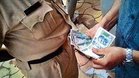 police bribe.jpg