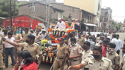 Procession in the presence of few dignitaries in Tasgaon