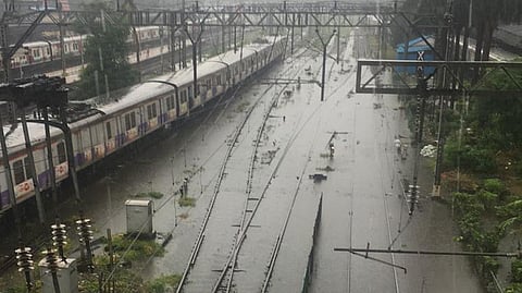 mumbai local train services hit due heavy rainfall
