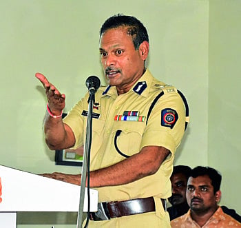 police commissioner talk with people 