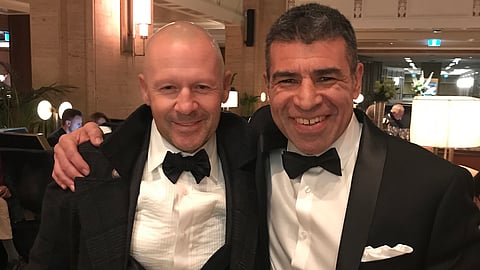 Eric Lamaze ja hänen henkilökohtainen kuntovalmentajansa Alex Moraes Toronto Horse Show'ssa marraskuussa 2019. 