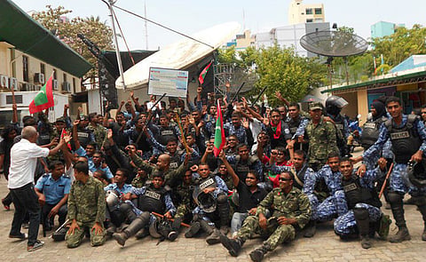 Mutinying security forces inside the MNBC compound.