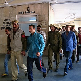 The workers being brought to the district court in February 2015.
Photo: Anumeha Yadav