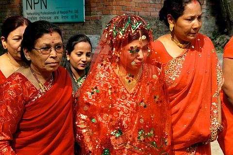 A Nepali bride at a wedding in Kathmandu 
(Image is for illustrative purpose only) 
Photo : Flickr / Silke