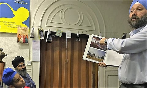 Amardeep Singh talks about his travels in Pakistan at the E-5 Center in Boston. Photo: Beena Sarwar. 