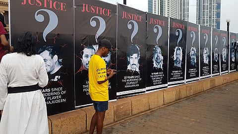 On World Press Freedom Day 2022, journalists and allies put up posters of murdered, tortured and abducted journalists along fences of the Presidential Secretariat. Photo courtesy: Amalini De Sayrah.