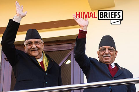 Nepal's newly appointed Prime Minister Pushpa Kamal Dahal 'Prachanda' (R) and Khadga Prasad Sharma Oli (L) chairman of the CPN(UML) party wave at media after reaching a power-sharing deal at Balkot, Bhaktapur. Despite a lacklustre performance from the Maoists, Dahal's political manouvre in quitting his alliance with the Congress party to join with Oli led to his election as prime minister. 25 December, 2022. Photo: NurPhoto / IMAGO.