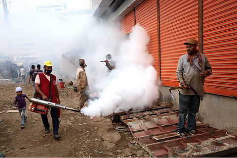Workers of the Dhaka City Corporation spray pesticides to prevent dengue and other vector-borne diseases.  As of 24 January 2023, over 60,000 dengue cases were reported across Bangladesh – the second-largest dengue outbreak in the country in 22 years. Photo courtesy: ZUMA Wire / IMAGO