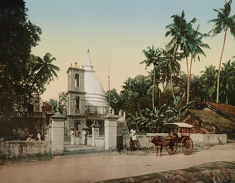 A Buddhist temple on a road to Galle, circa 1890. The agrarian utopia captured in the trope of vavai, pansalai, gamai, yayai (tank, temple, village and paddy field) became a concrete political project in post-independence Sri Lanka. Embedded in this is the case for a radical devolution of power. Photo: Wikimedia Commons