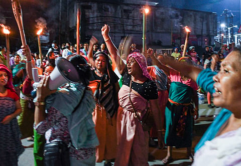 Meira Paibis chant anti-government and anti-police slogans during a road blockade in Imphal in July 2023. Meitei women’s role in attacks on Kuki women, including sexual assaults, bears particular examination. Photo: IMAGO / ZUMA Wire
