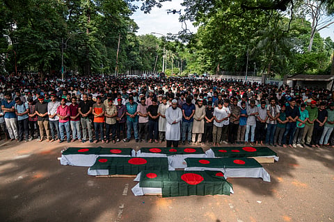 Students enact a funeral procession for their killed comrades outside Dhaka University. Student protests spiralled into a mass uprising after Bangladesh's government and ruling party unleashed a wave of brutal repression.