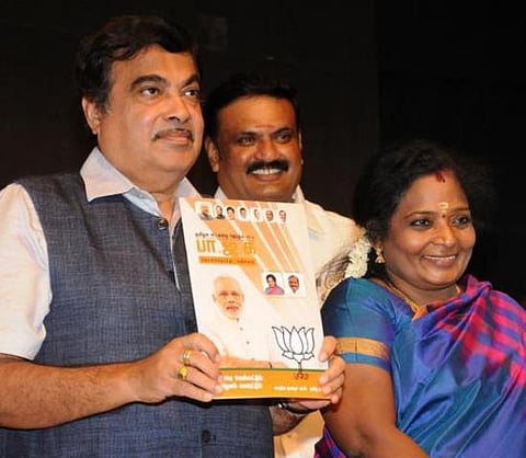 பூரண மதுவிலக்கு, தினமும் 20 லிட்டர் இலவச குடிநீர், மதமாற்ற தடைச் சட்டம்: பாஜக தேர்தல் அறிக்கை