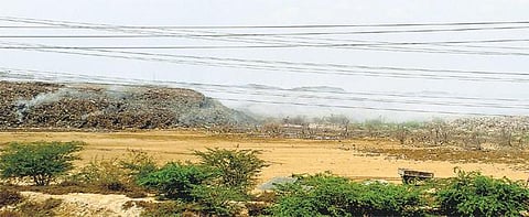 குடியிருப்பு அருகிலேயே குப்பை கொட்டும் வளாகம்: ஆர்.கே.நகரில் சுவாச கோளாறால் மக்கள் அவதி