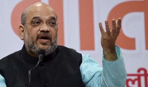 மன்மோகன் சிங்குடன் ஒப்பிடும்போது மோடியின் வெளிநாட்டுப் பயணங்கள் குறைவு: அமித் ஷா கருத்து