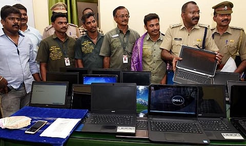 புதுச்சேரி பேருந்து நிலையத்தில் தொடர் லேப்டாப் திருட்டில் ஈடுபட்ட  நபர் கைது; 19 லேப்டாப்கள் பறிமுதல்