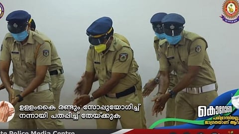 முகக்கவசத்துடன் நடனமாடிய கேரள போலீஸார்: வைரலாகும் வைரஸ் விழிப்புணர்வு வீடியோ