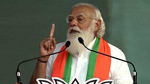 பிரதமர் காலில் விழ முற்பட்ட அதிமுக எம்.பி.