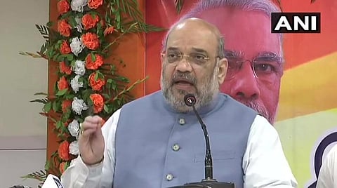 ஜார்கிராம் நகரில் இன்று காலை அமித் ஷா தேர்தல் பிரச்சாரத்தில்  ஈடுபட்ட காட்சி: படம் | ஏஎன்ஐ.