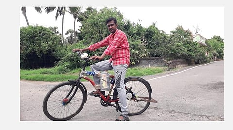 பாஸ்கரன் வடிவமைத்துள்ள மின்சாரத்தில் இயங்கும் சைக்கிள்.