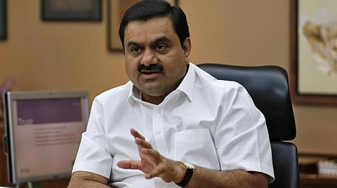 சிமெண்ட் தொழிலில் அதானி குழுமம் விஸ்வரூபம்: 2 நிறுவனங்களை வாங்க ரூ.82 ஆயிரம் கோடியில் ஒப்பந்தம் 