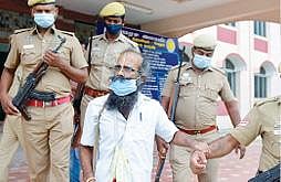 காவல்துறை பாதுகாப்புடன் வேலூர் நீதிமன்றத்துக்கு அழைத்து வரப்பட்ட முருகன். படம்: வி.எம்.மணிநாதன்.