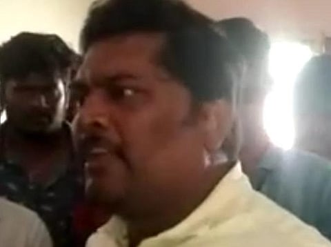 கைதான பேராசிரியர் சண்முகராஜா.