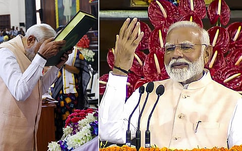 இந்திய அரசியலமைப்பு புத்தகத்தை வணங்கிய பிரதமர் மோடி.