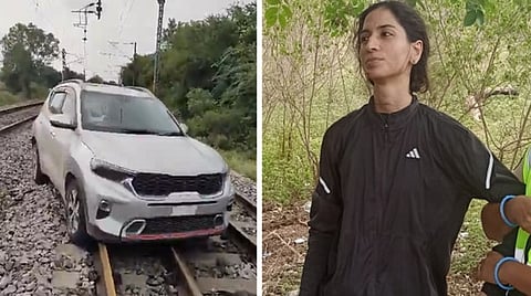 தண்டவாளத்தில் கார் ஓட்டிய பெண் கைது: 2 மணி நேரம் ரயில் போக்குவரத்து பாதிப்பு