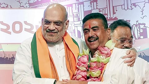 மத்திய அமைச்சர் அமித் ஷா மற்றும் மேற்குவங்க முதல்வராக தேர்வாகி உள்ள சுவேந்து அதிகாரி