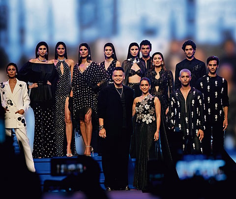 Designer Nachiket Barve with showstopper Sanya Malhotra and other models
