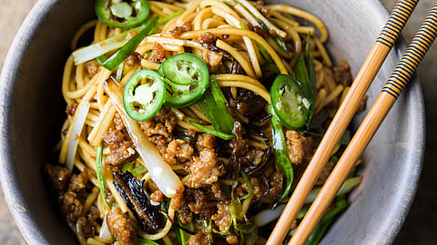 In frame: Scallion noodles 